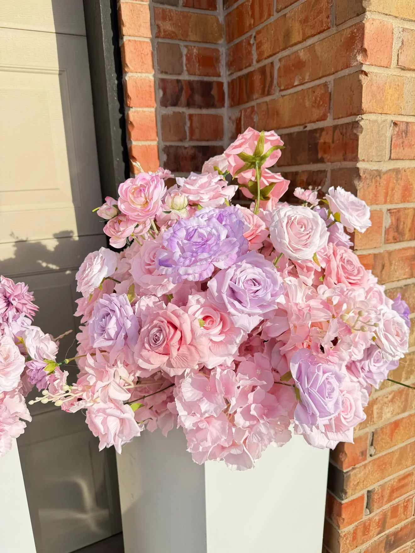 Detail view of blush garden floral arch rental in Oklahoma City