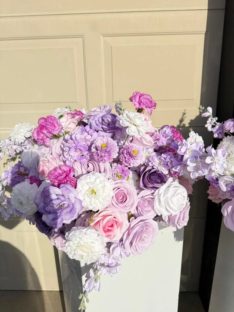 Close detail of lavender and pink rose rental florals OKC